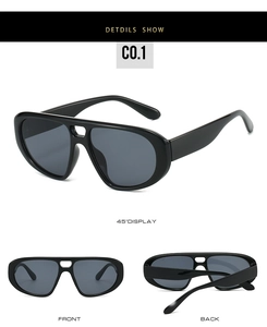Gros plan sur des lunettes de soleil aviateur noires avec double pont et verres anti-UV