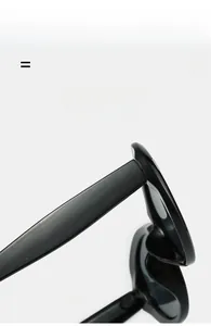 Detail of high-gloss texture and super elastic hinge of black cat-eye sunglasses