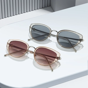 Chic cat eye metal sunglasses with grey and brown gradient lenses for UV protection