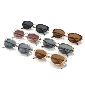 Modern cat eye sunglasses collection with metal frames and multiple color variations