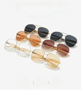Detail of five assorted vintage aviator sunglasses with metallic frames and dual bridges