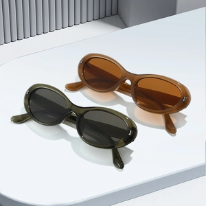 Retro small oval frame sunglasses with cat-eye design and UV protection for street style