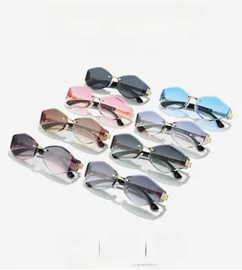 Collection of rimless geometric sunglasses featuring multi-faceted cut lenses in assorted colors