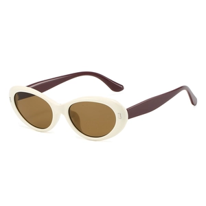 Retro oval sunglasses with creamy white frame and dark burgundy temples for street style