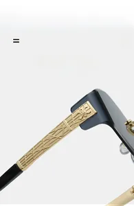 Macro detail of gold-plated eyeglass temples with geometric textured engravings
