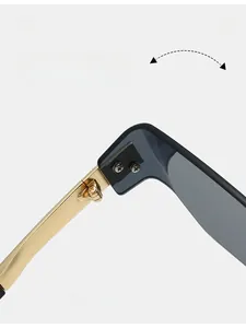Detail of durable gold metal hinge and high-quality screw on rimless sunglasses