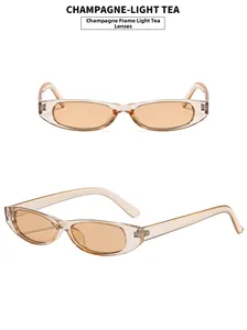 Detail view of champagne oval sunglasses with light tea lenses and metal hinges