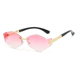 Pink gradient rimless sunglasses with gold metal frame and unique butterfly cut lenses