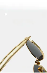 Detailed macro view of lightweight gold metal sunglasses frame with high-elastic temples