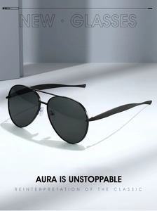 Close-up of black metal aviator sunglasses with classic double bridge and silicone pads