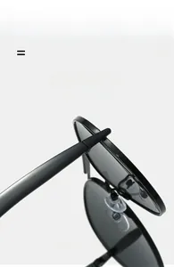 Macro view of flexible metal hinges and sleek temples on retro aviator sunglasses