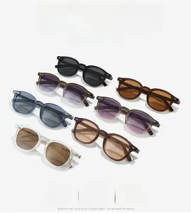 Detail view showing seven color variations of trendy TR sunglasses with metal rivet accents