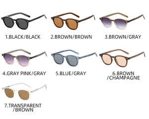 Collection of various colored round TR90 sunglasses with gradient lenses for outdoor style