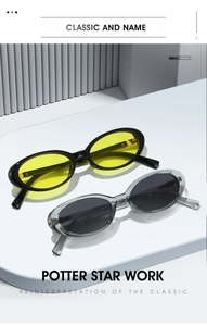 Classic oval frame sunglasses in yellow and grey lenses shown on a minimalist display