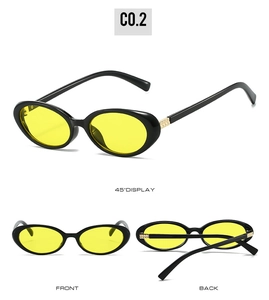 Three-angle views of oval black frame sunglasses with yellow lenses and gold metal accents