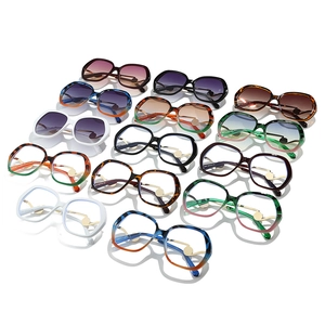 Oversized pearl-accented sunglasses collection in classic and gradient colors