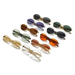 Set of ten vintage oval metal sunglasses in various lens colors with gold and silver frames