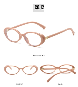 Detailed views of vintage oval small frame glasses with gold plaid temple accents