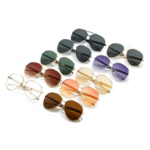 Classic aviator sunglasses with metal frames in various colors showing UV protection