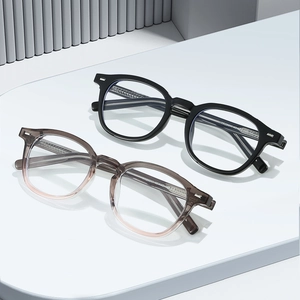 Modern oversized TR90 anti-blue light glasses in black and transparent brown frames