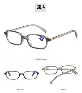Macro view of square reading glasses with golden diamond texture and +2.00 power sticker