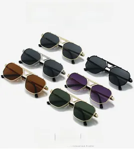 Close-up of square hollow metal frame sunglasses with various gradient colored lenses