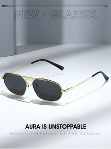 Detailed close-up of golden metal irregular polygonal aviator sunglasses with black lenses