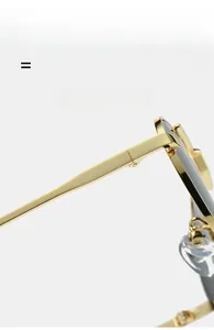 Detail view of gold sunglasses showing durable metal hinges and soft silicone nose pads
