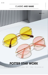 Macro detail of retro round gold-frame sunglasses with yellow and pink lenses