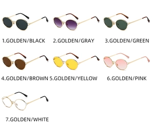 Group display of round metal sunglasses and clear glasses in seven lens colors and gold frames