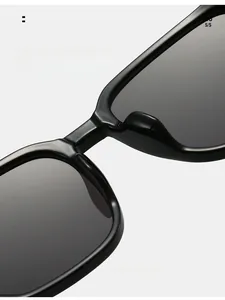 Detail of integrated comfortable nose pads on black oversized square sunglasses