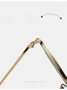 Macro detail of the durable golden metal hinge with precision screws on trendy sunglasses