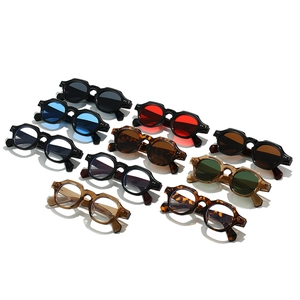 Retro round frame sunglasses in various colors displayed in a neat grid pattern