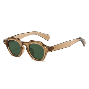 Retro round frame sunglasses in transparent tea brown with dark green lenses and metal rivets