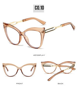 Vues détaillées de lunettes œil de chat ambre avec branches dorées à motif ajouré