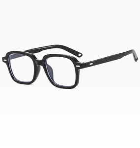 Detail of black square frames with silver rivets and blue light filtering lenses