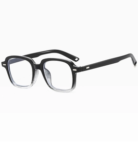 Detail of gradient black to clear square eyewear frames with silver metal rivets