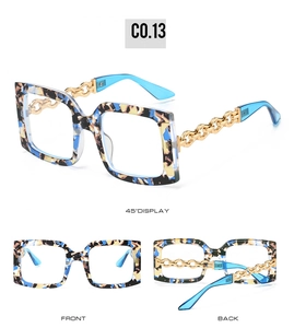 Detail of square oversized tortoise sunglasses with gold metal chain temples in various views