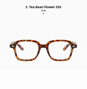 Detail of square demi tortoiseshell acetate eyeglass frame with silver rivet accents