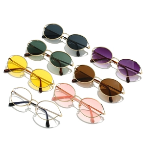 Retro metal frame oval sunglasses in six assorted colors with a minimalist vintage style