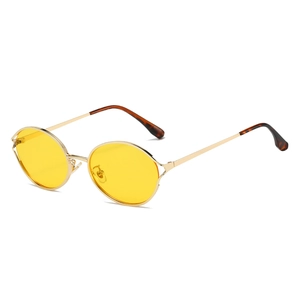 Retro round sunglasses with yellow lenses and slim gold metal frame shown at 45-degree angle