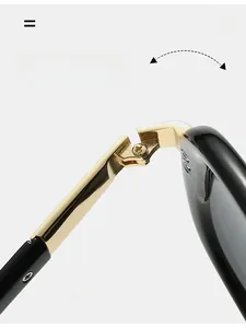 Macro view of durable golden metal hinge on black glossy frame windproof sunglasses