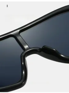 Close-up of comfortable integrated nose pads on black shield frame sunglasses