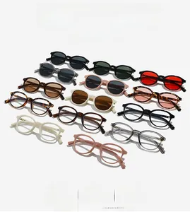 Affichage matriciel de lunettes de soleil rondes vintage en diverses couleurs et matériaux de qualité