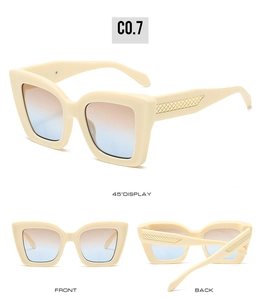 Detailansicht der cremefarbenen quadratischen Sonnenbrille mit gesteppten goldenen Bügeln