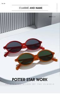 Detail of retro oval sunglasses in translucent red and solid orange frames with dark lenses