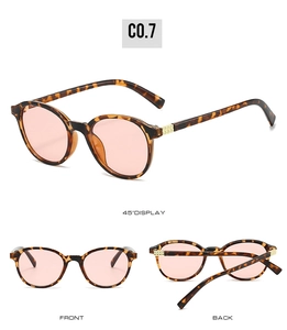 Vue triple de lunettes de soleil rondes en écaille avec verres roses et détails dorés