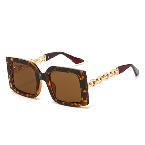 Classic tortoise square sunglasses with brown lenses and golden chain metal temples