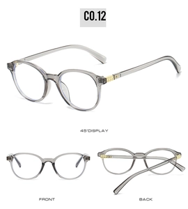 Vue détaillée des lunettes de soleil rondes gris transparent avec détails en métal doré