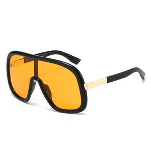 Fashion oversized shield sunglasses with black frame, orange lenses and gold metal accents